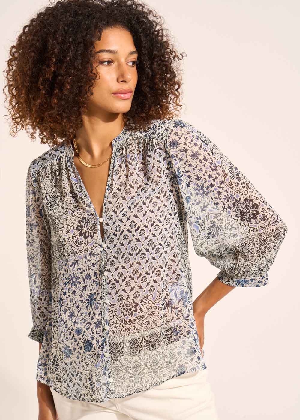 Printed flowing blouse with round neck and long puffed sleeves - Sud Express - 1 - Sud Express